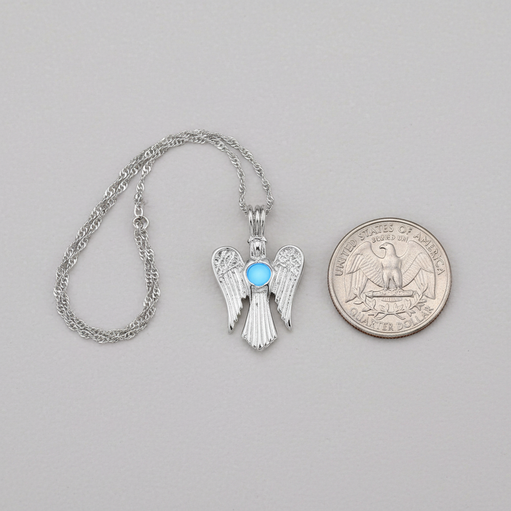 Luminous Angel Wing Pendant compared with a U.S. quarter